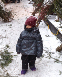 Tahra wearing her new purple Bogs during a snowstorm.